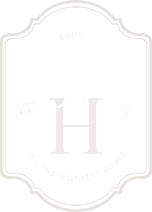 The Wellness House crest